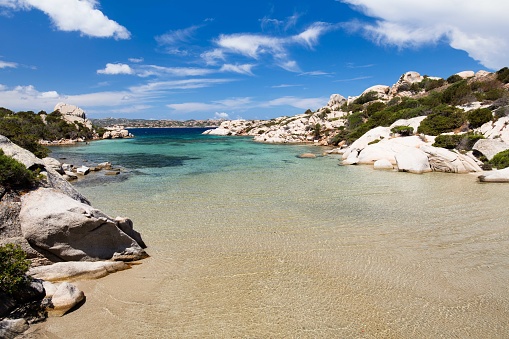 There are many wonderful beaches on the island of Caprera. One of the most beautiful is Cala Serena, which can only be reached by sea or by a trek. Its incredible colors stand out against the granite rocks, Mediterranean scrub and brown sand.