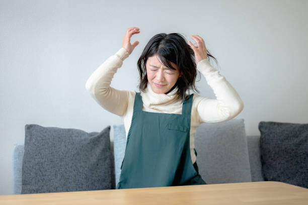woman tired - 涙 日本人 ストックフォトと画像