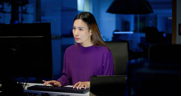 istock Mature woman working in office 2150654438