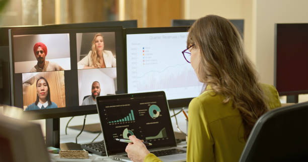 istock Businesswoman with colleagues during conference call 2150654444