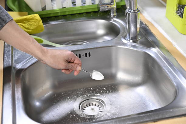 istock Lifehacks; Baking soda poured to unclog drainage system at home 2150655848