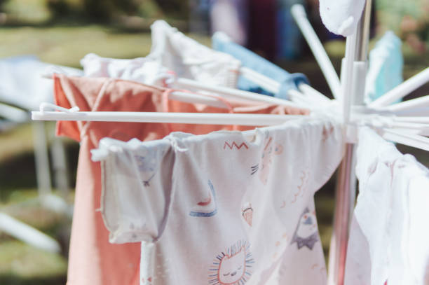 istock Baby clothes and diapers dried under sunlight 2150656842