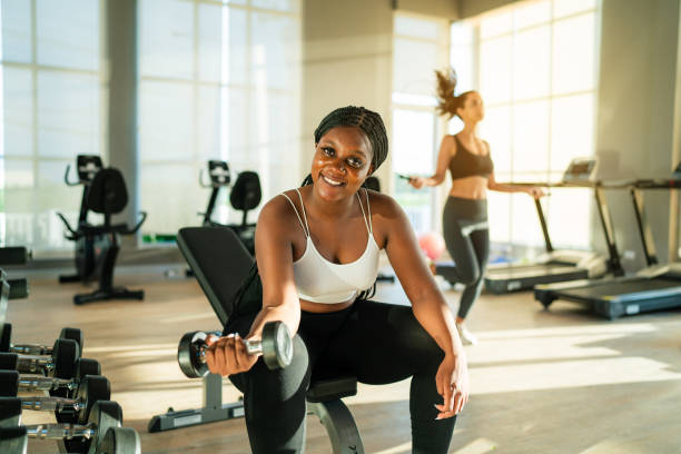 istock Fitness exercising in gym. 2150659878