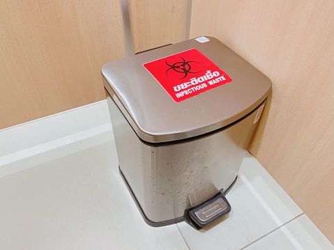 Infectious trash cans are placed inside hospital bathrooms.