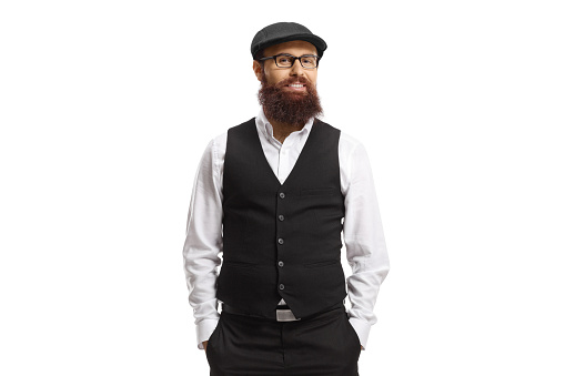 Bearded man in a white shirt and black vest isolated on white background