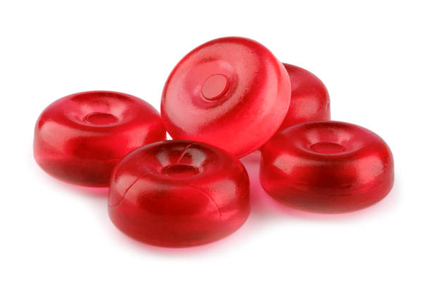 Red fruit lollipops isolated on white. lollipop, candy, sweetness