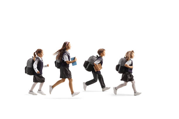 istock Group of schoolchildren running 2150662190