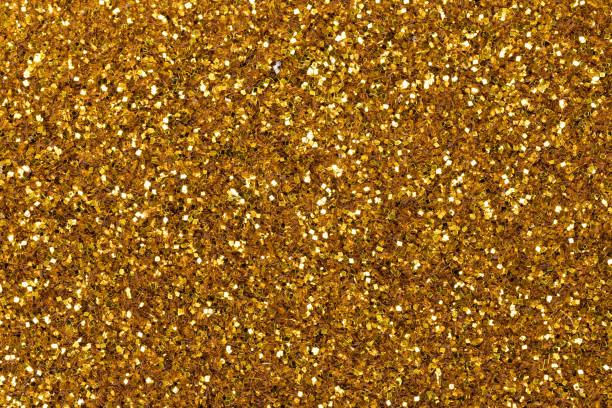 istock Shiny glitter texture, Christmas background in excellent gold tone. 2150663838