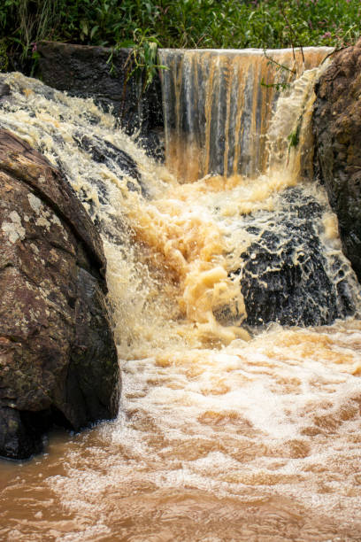 istock A rocky waterfall in the countryside 2150664217