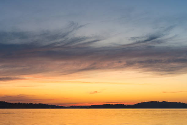 istock Sunrise on Calm Lake 2150664380