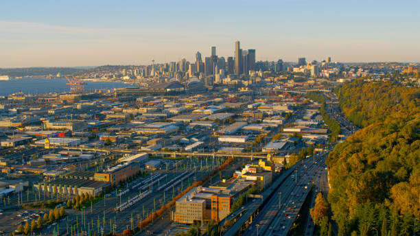 Aerial view of South Seattle cityscape against sky during sunset, Washington State, USA.
