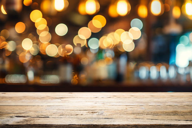istock Empty wooden table for present product on coffee shop blur background. 2150669127