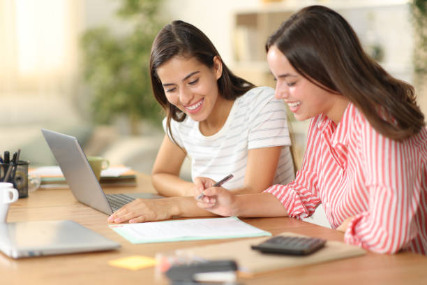 istock Happy tele workers signing contract at homeoffice 2150672026