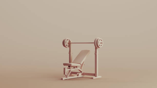 istock Weight bench training equipment barbell gym neutral backgrounds soft tones beige brown 2150673703