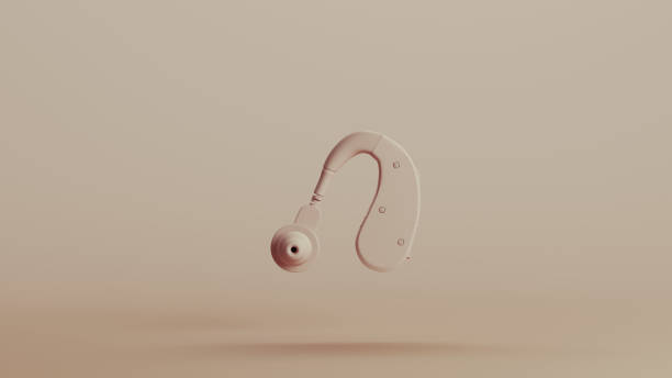 istock Hearing aid audio impairment device deafness neutral backgrounds soft tones beige brown left view 2150673749