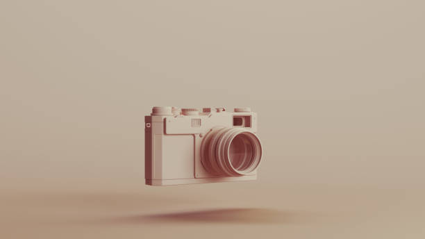 istock Camera lens retro style nostalgia neutral backgrounds soft tones beige brown background 2150674044