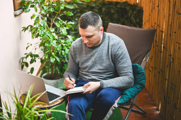 istock Man checking financial numbers at home office. 2150676519