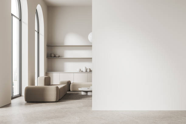 istock White living room interior with sofa and blank wall 2150679616