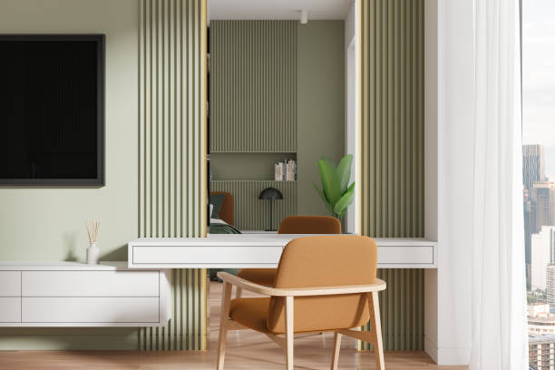 istock Home bedroom interior with beauty table, tv screen and panoramic window 2150680476
