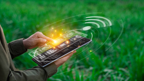 istock Farmers use agricultural technology in data analysis tablets and image icons. New technologies in agricultural business concepts. Men use tablets to research and develop plant varieties, agricultural technology 2150680855