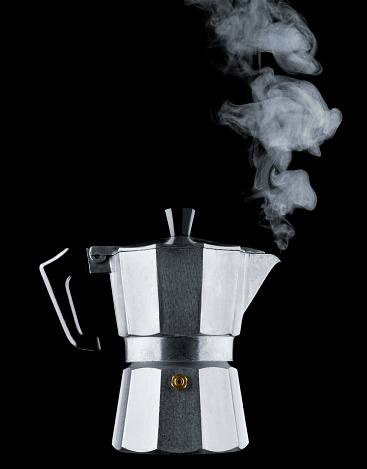 Coffee Mocha espresso express maker with white smoke isolated on black background