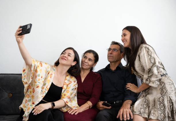 istock Family taking selfie at home 2150682030