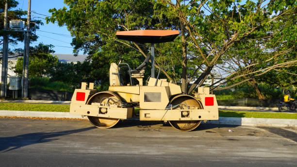 istock Road Roller parking on the side of the road 2150683268