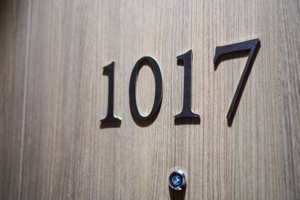istock Numbers 1017 on door, close up image 2150683275