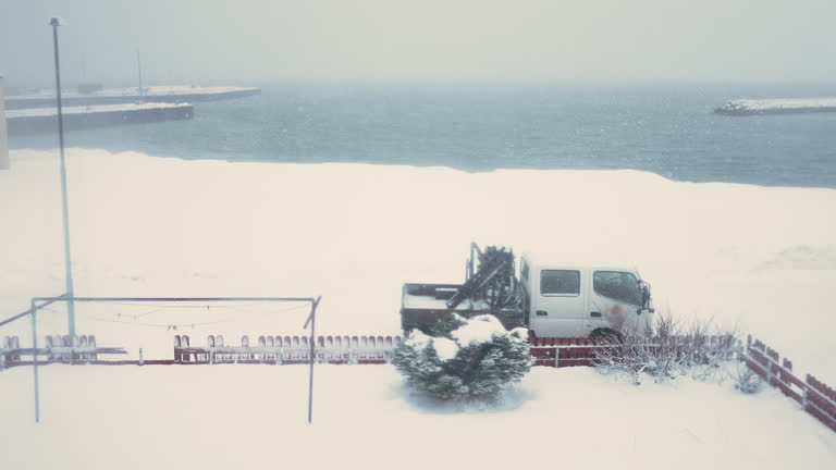 extreme weather Backyard with coastline during winter snowing