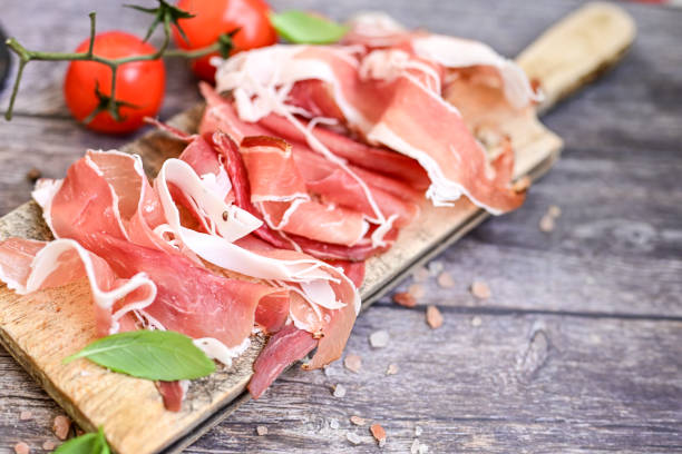 istock Prosciutto Crudo on a wooden  cutting board . 2150685504