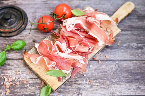istock Prosciutto Crudo on a wooden  cutting board . 2150685622