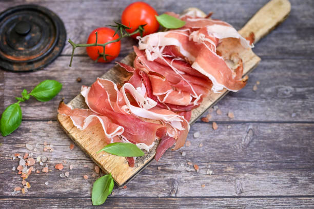 istock Prosciutto Crudo on a wooden  cutting board . 2150685682
