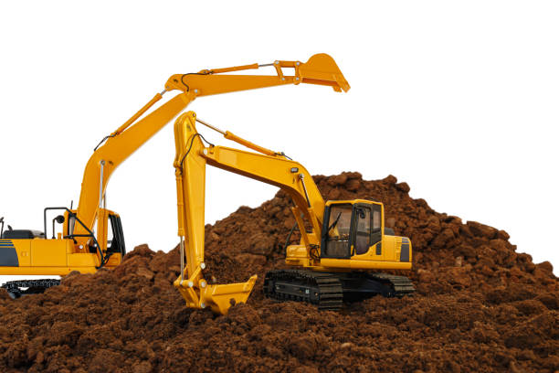 istock Two excavators are digging the soil in the construction site 2150685816