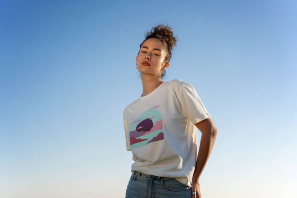 istock Fashionable Woman in Sunlit Pose 2150687087