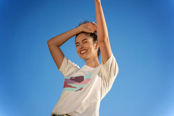 istock Fashionable Woman in Sunlit Pose 2150687716