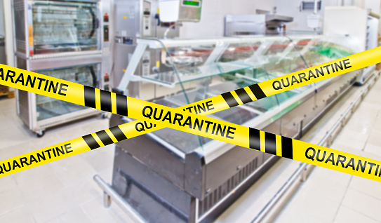 Closing the store for a coronavirus quarantine. An empty store marked Quarantine. Restrictions for dealing with Covid-19.Introduction of restrictive measures due to the epidemic of a dangerous disease
