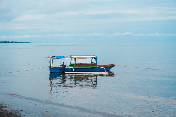 Fishermen looking for fish on the beach