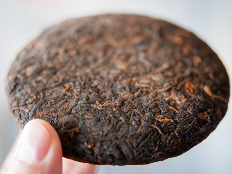 Close-Up Image of a Tea Cake Held by Hand