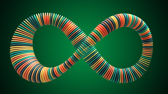 Abstract infinity symbol with multicolor circles.  3d render isolated on the green background