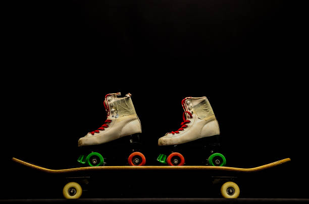 istock Two pairs of roller skates are on a skateboard 2150697243