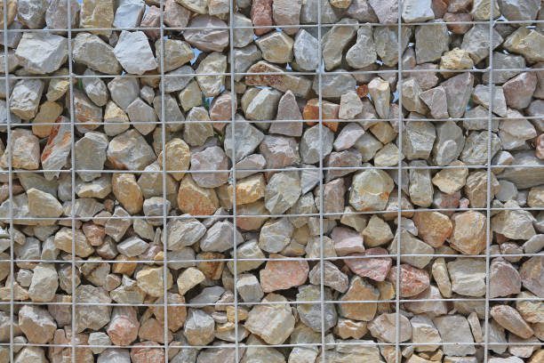Stone wall with steel bar for background.