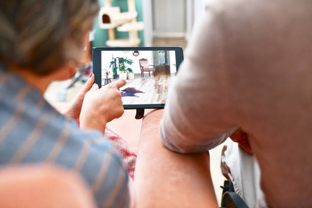 istock Tablet, screen or mature couple on app for home renovation, interior design or aesthetic comparison. Digital, display or people in living room with online shopping for real estate or property decor 2150698630