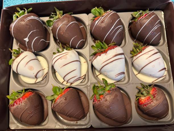 istock Chocolate covered strawberries in a gift box 2150698856