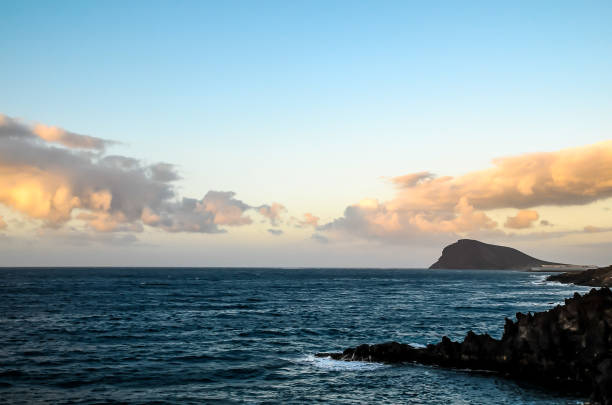 istock The ocean is calm and the sky is blue 2150699142