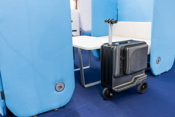 istock Electric scooter suitcase at the airport. 2150700975