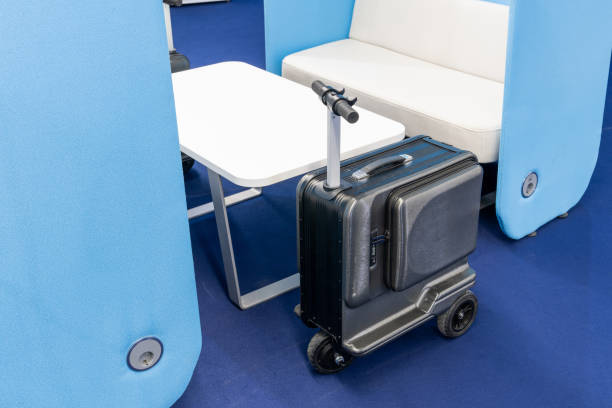 istock Electric scooter suitcase at the airport. 2150701603