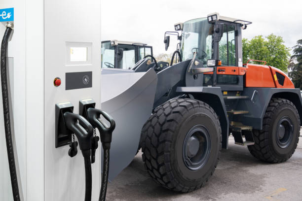 istock Electric construction machines with charging station 2150702222