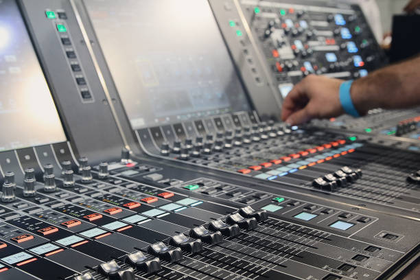 istock Sound engineer hands adjusting control sound mixer in recording, broadcasting studio 2150702887