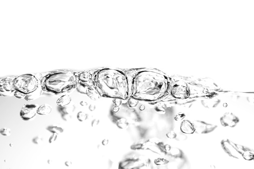 Photographs of air bubbles and clear water surface give a refreshing feeling. On a white background. Isolated.