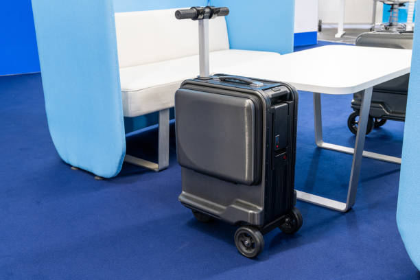 istock Electric scooter suitcase at the airport. 2150703525